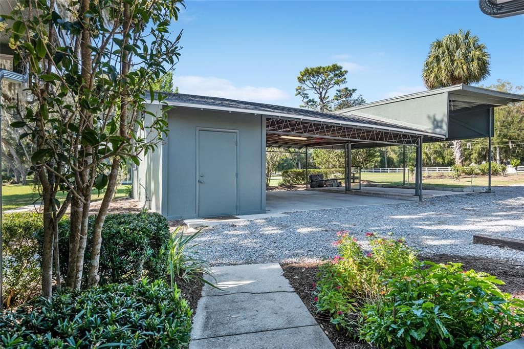 Large Carport with Space for 3 Vehicles, Plus Workshop or Storage of Lake Toys