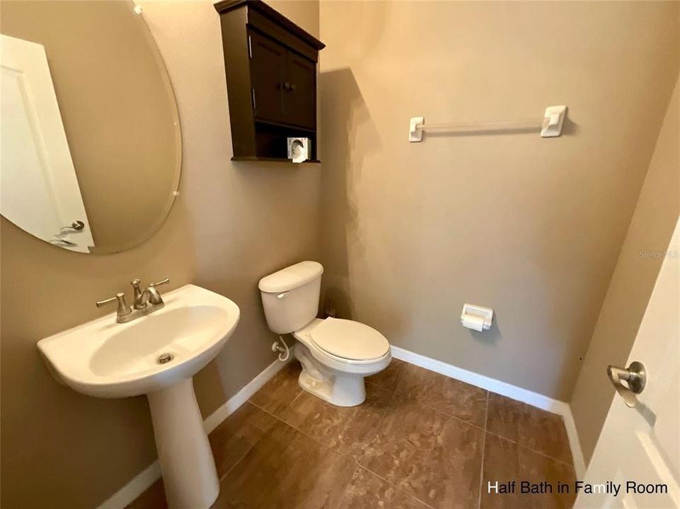 Half bathroom downstairs in Family room