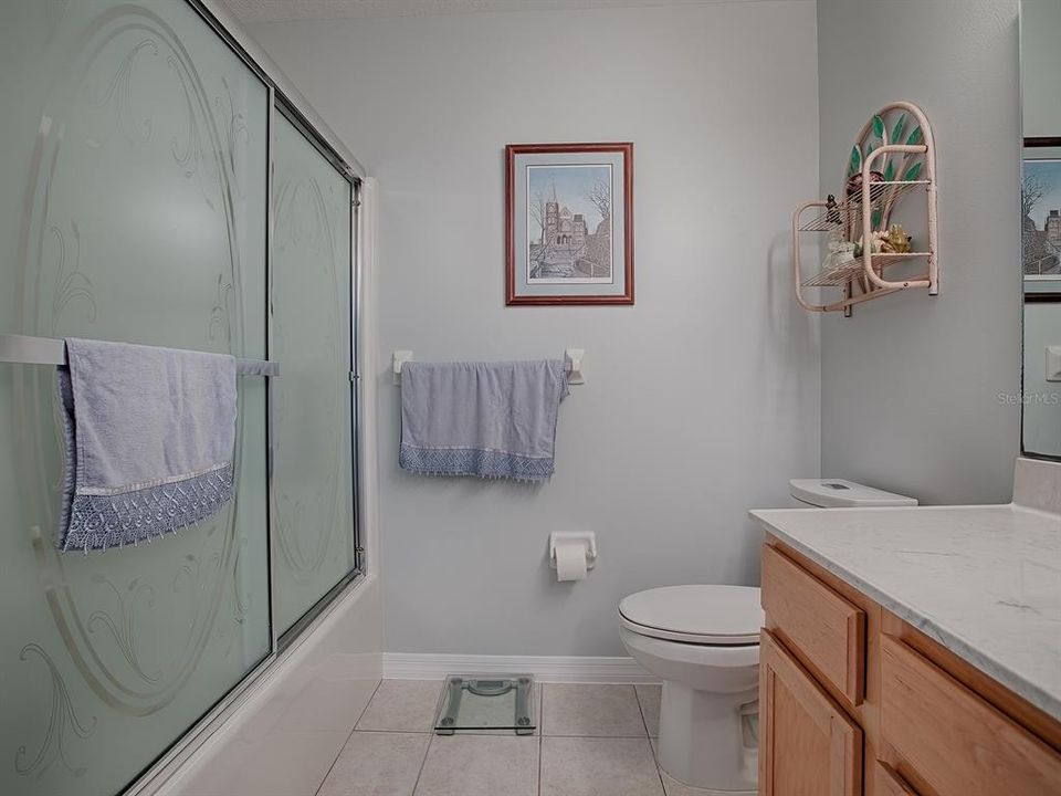 GUEST BATH HAS A TUB/SHOWER COMBO