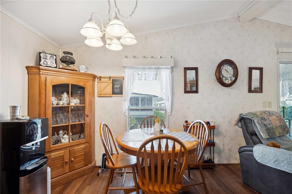 Dining area is open with kitchen and living room.