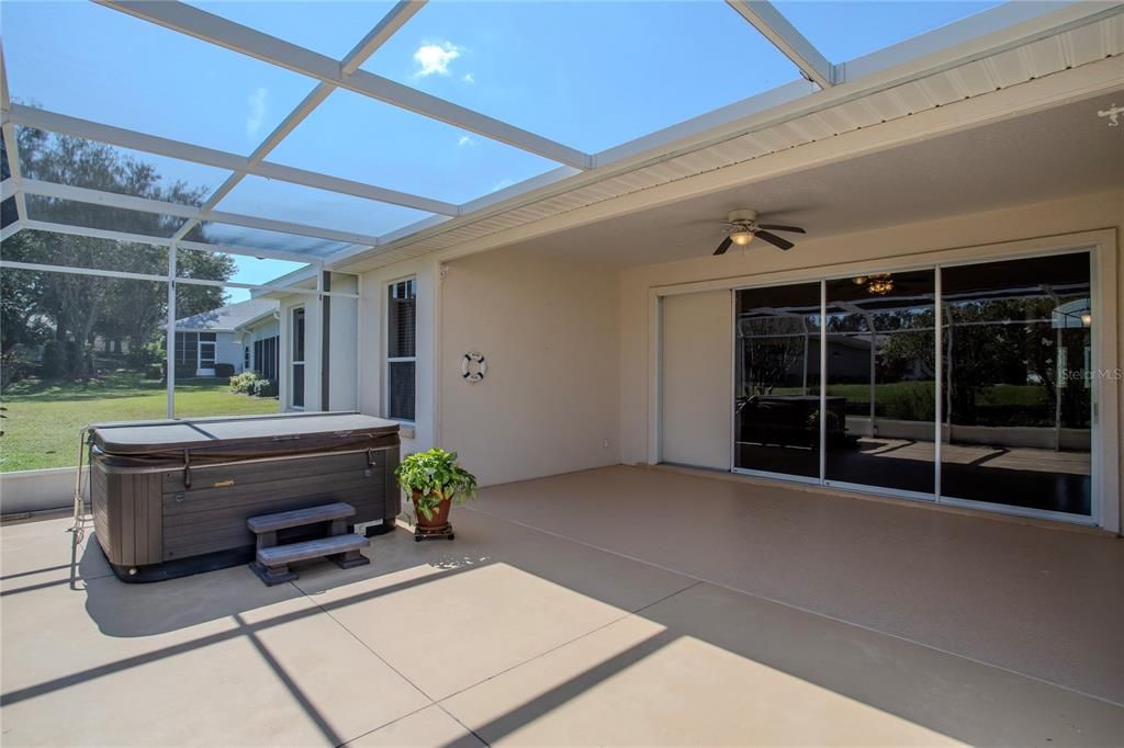 Screened birdcage off lanai with hot tub.