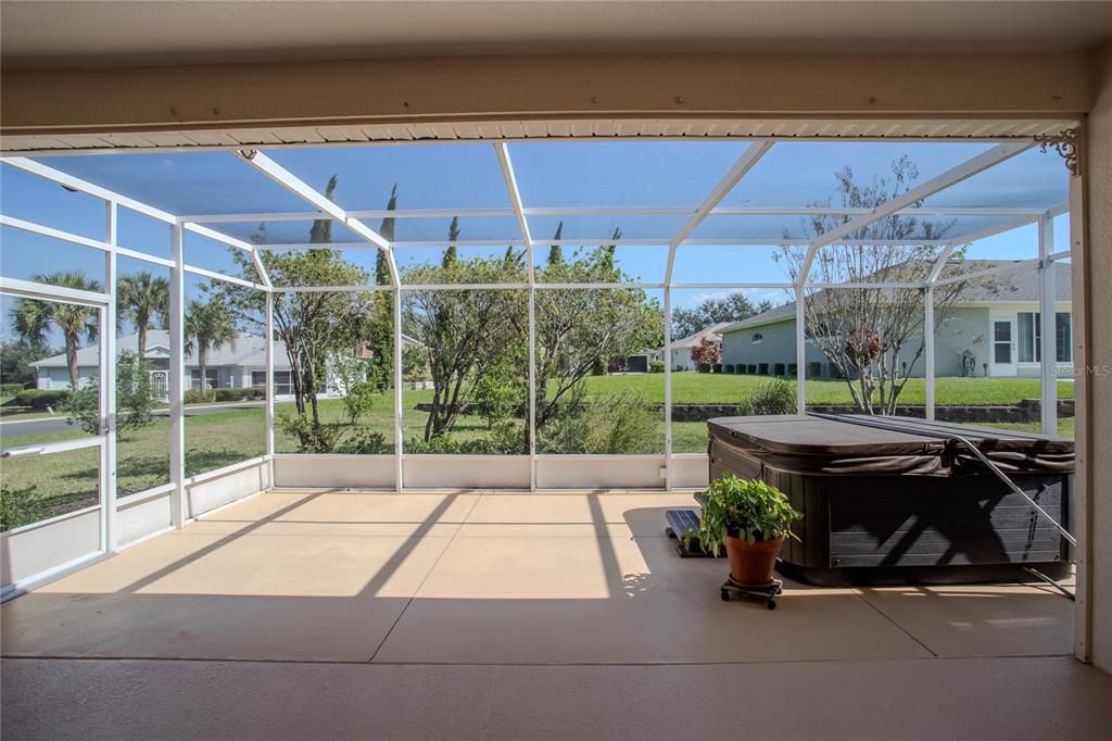 Covered Lanai and Screened Birdcage with Hot Tub