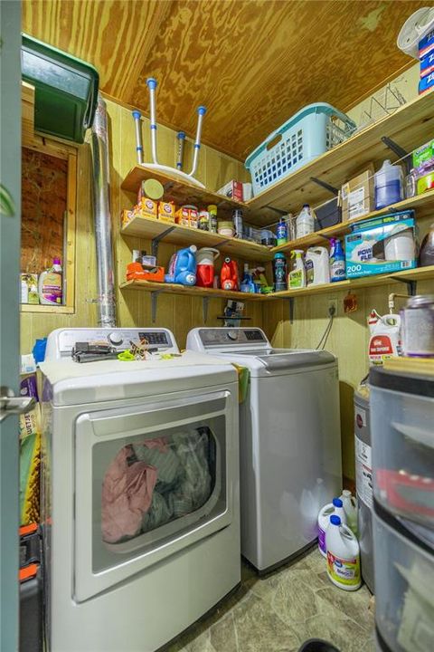 Washer & Dryer in enclosed room