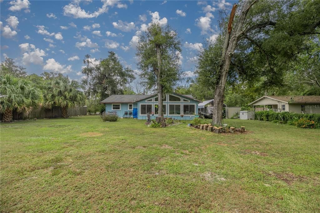 Large backyards w/ butterfly/bird gardens