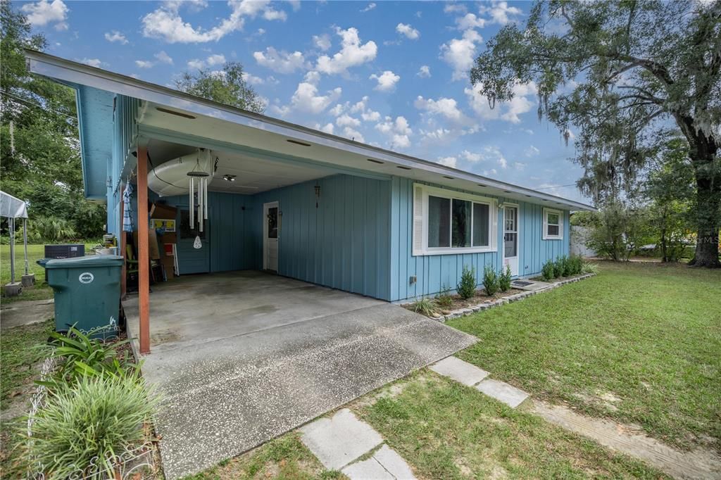 Carport w/ enclosed storage room