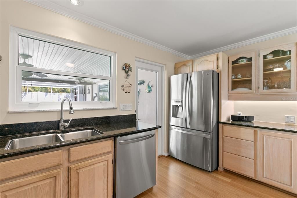 The Kitchen Overlooks the Pool and Lanai