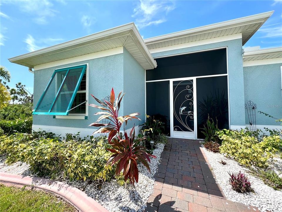 Large covered and screened entryway