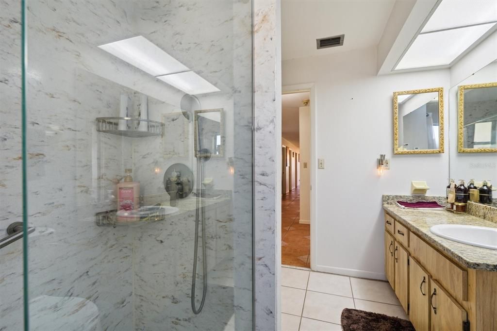 Updated, walk in shower in hall full bath