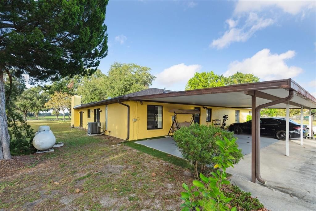 SW corner of home, large covered carport area