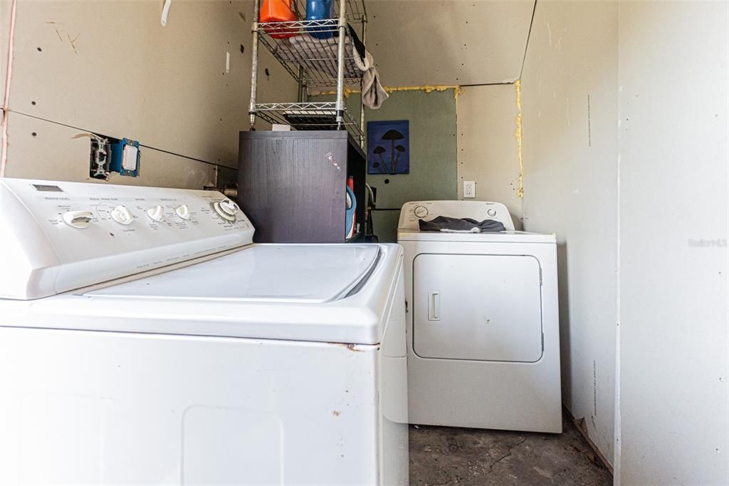 separate laundry room for guest units