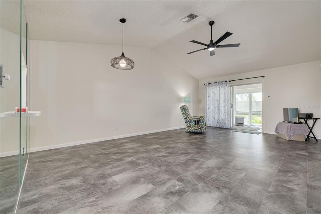 Dining and Living Room with Luxury Vinyl Flooring installed in 2022