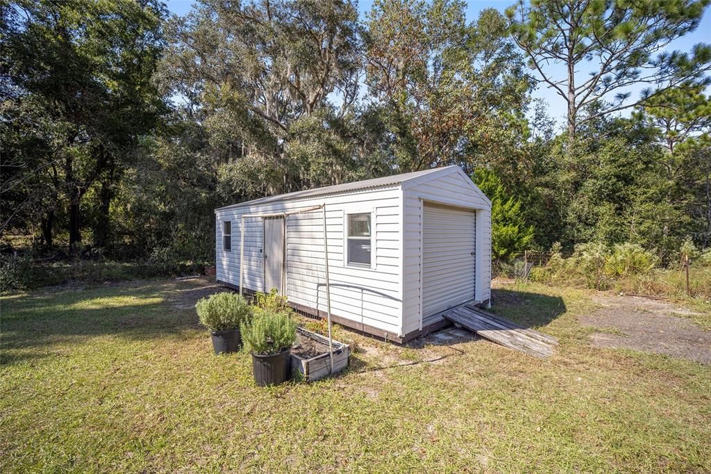 Shed that conveys only with full-price offer