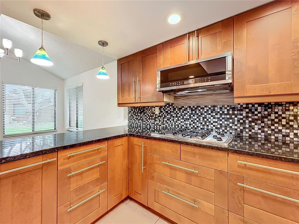 Kitchen with backsplash.