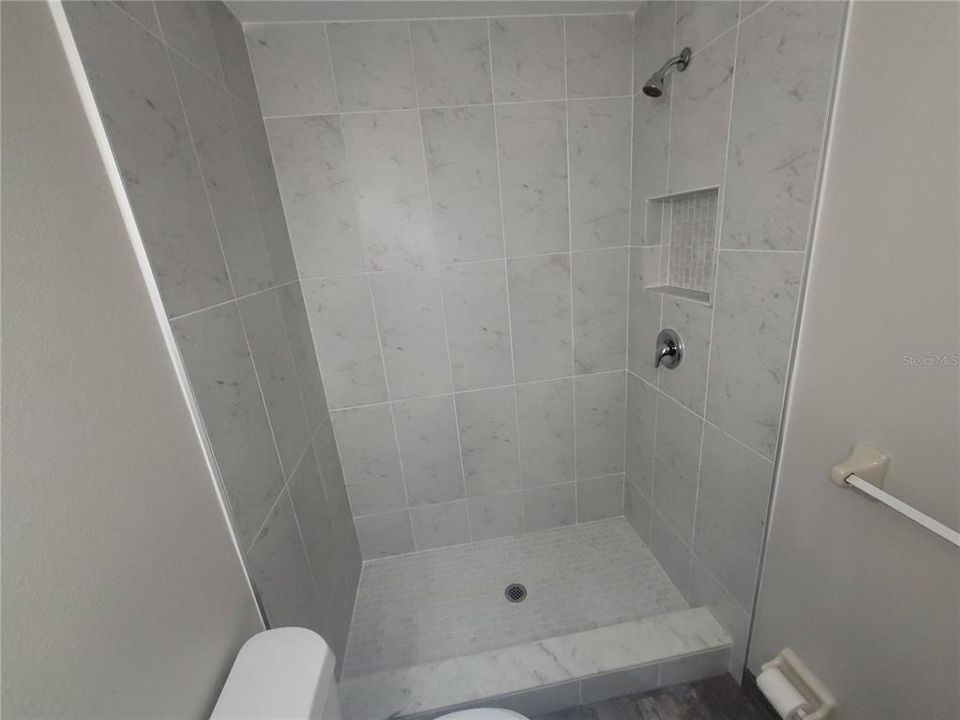 Walk-in shower in bath