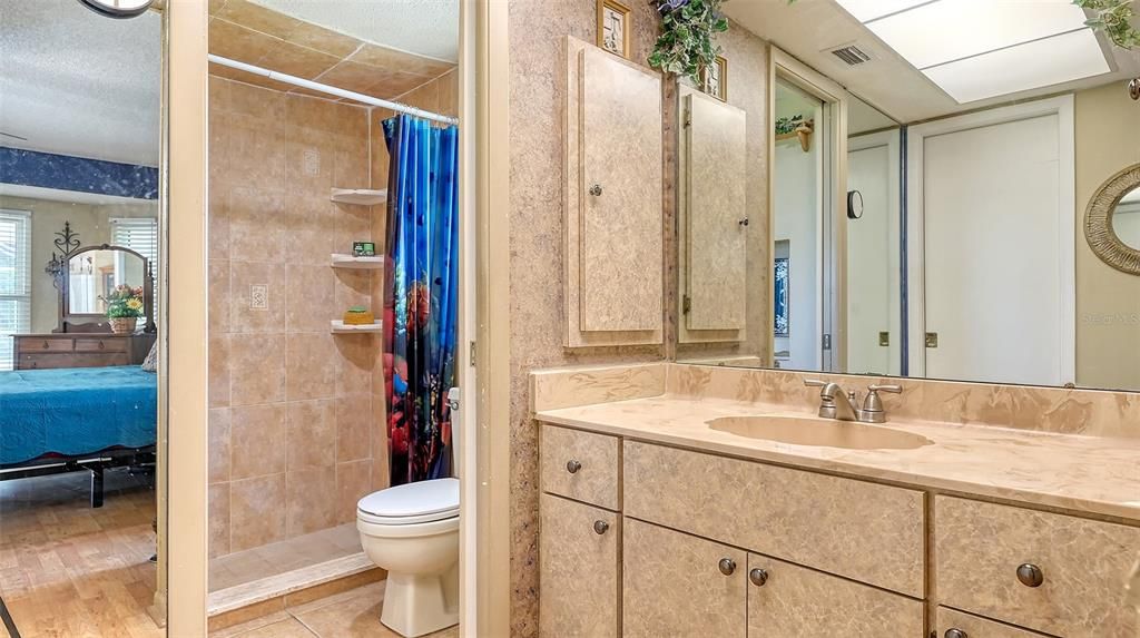 PRIMARY BATHROOM WITH STEP-IN SHOWER