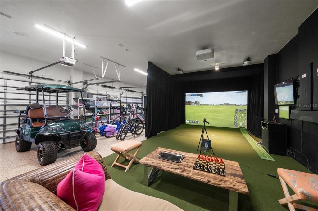 3 car garage with golf simulator