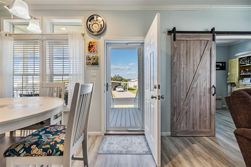 Storm door lets in more natural light from front porch!