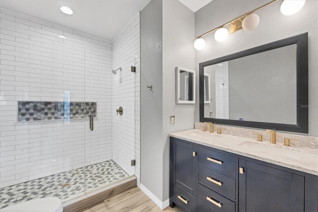 Updated master bath with dual vanities