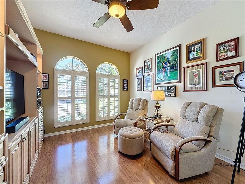 3rd bedroom/den w/ laminate flooring