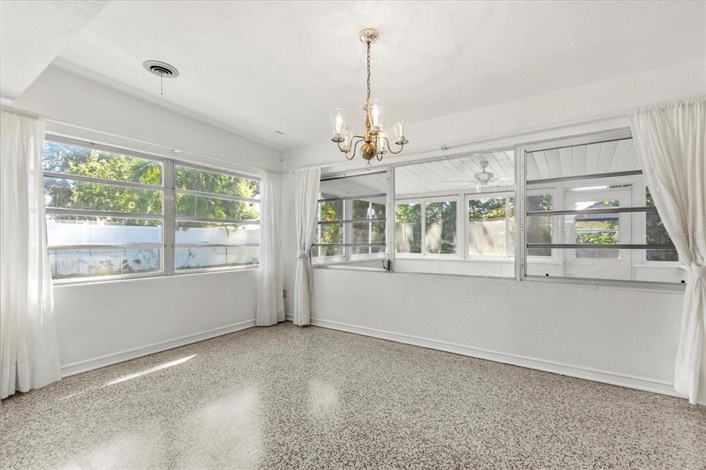 Dining room has lots of windows for natural light