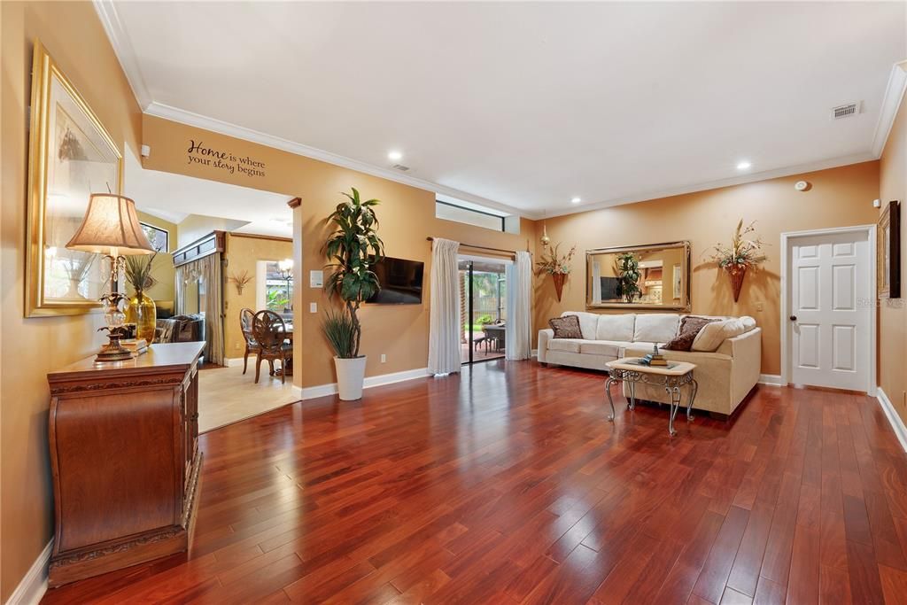 Formal living and dining spaces flowing into the kitchen, dinette area and family room.