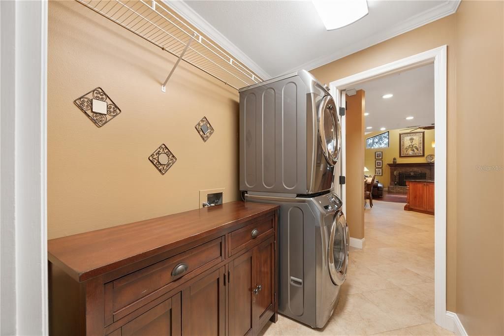 Inside laundry room is a pass through from the garage to the kitchen.