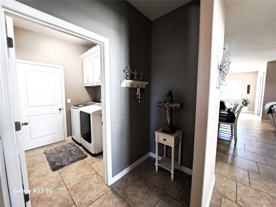 Laundry room off foyer