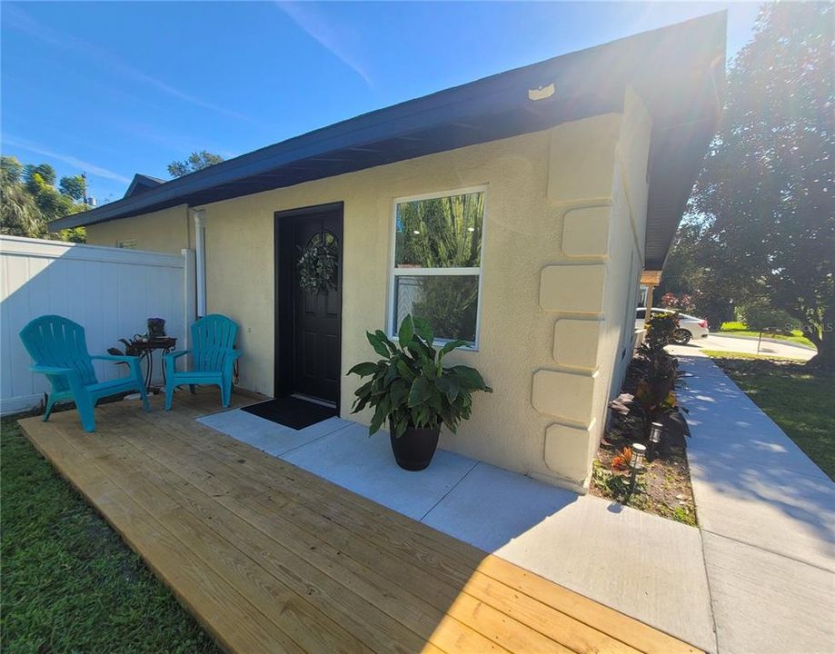 Walkway to your private entrance from paved parking. What a sweet retreat!