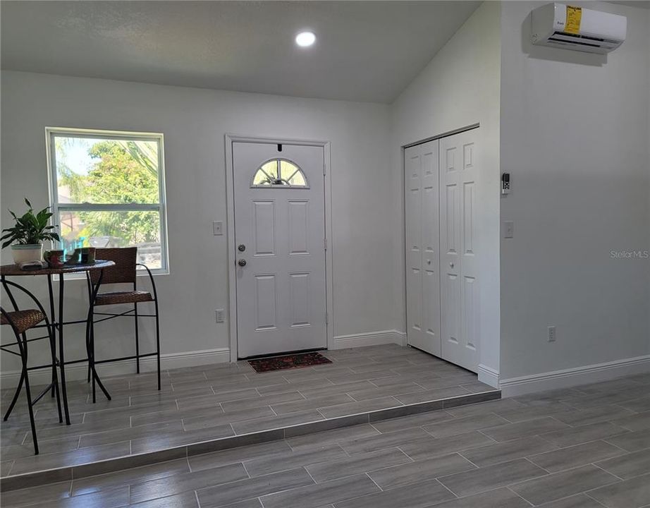 Dining area and entry foyer welcome you in to your new home!