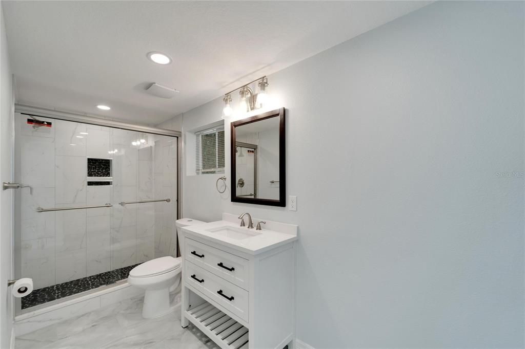 Master bathroom with new shower and vanity.