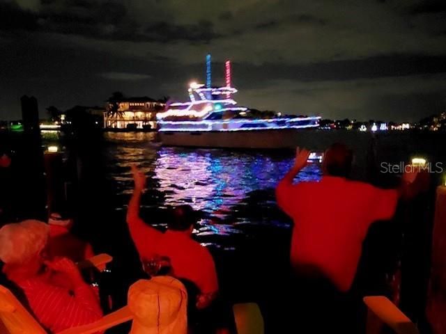 Boat parade goes right by your dock