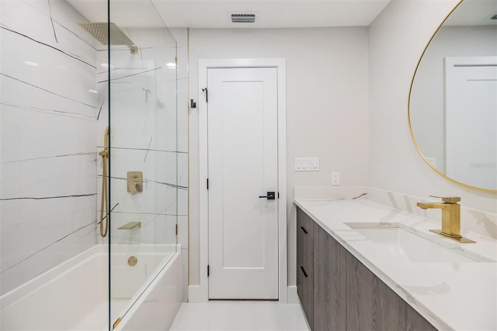 Bathroom 3, has additional door that leads to the pool area