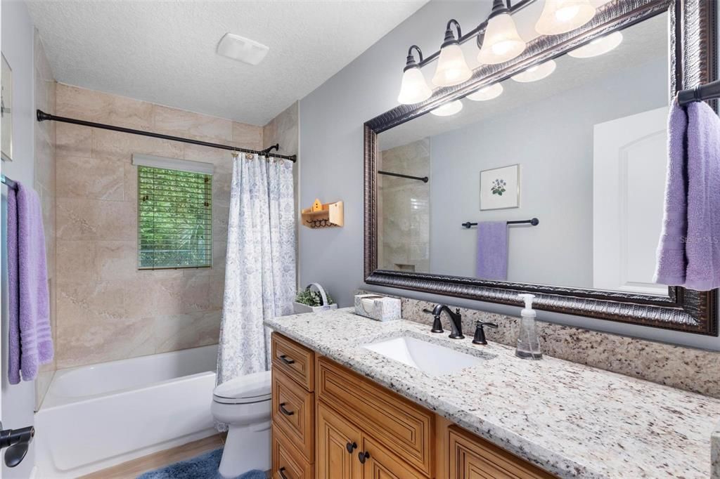 Guest Bathroom with a Shower/Tub Combination.