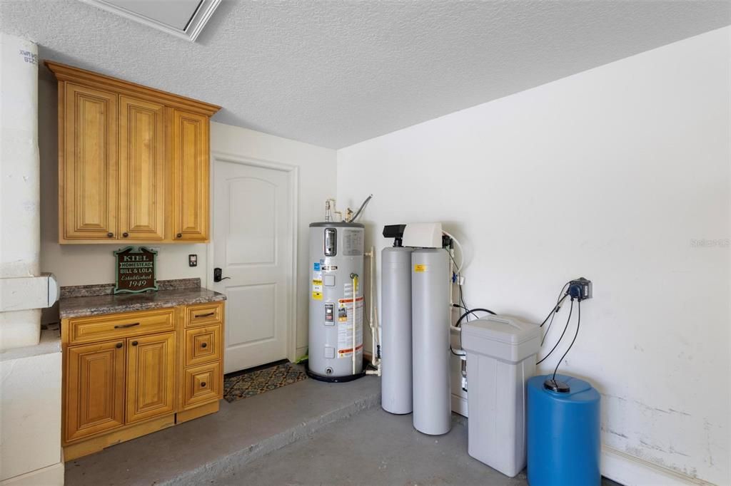 Built-in Cabinets and Water Softener System.