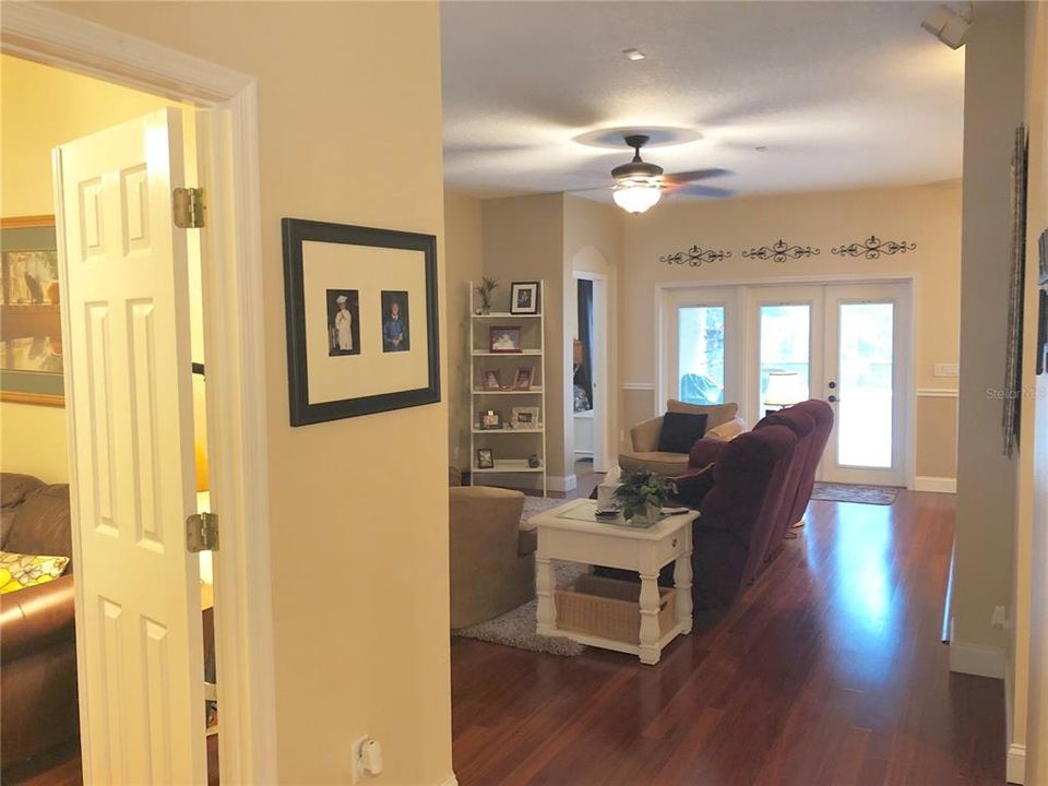 Entry hallway to living room and 4th bedroom