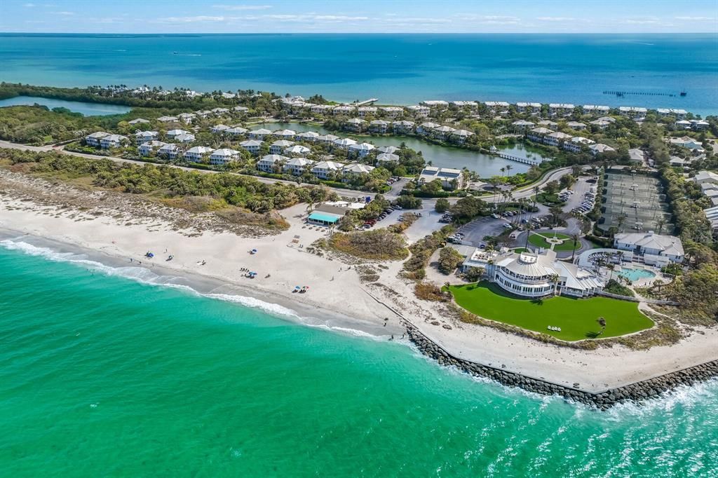 Aerial view of Pass Club/South Village and the infamous South Beach Restaurant. Photo taken pre-storm. Seawall and green lawn are under going repair/restoration.