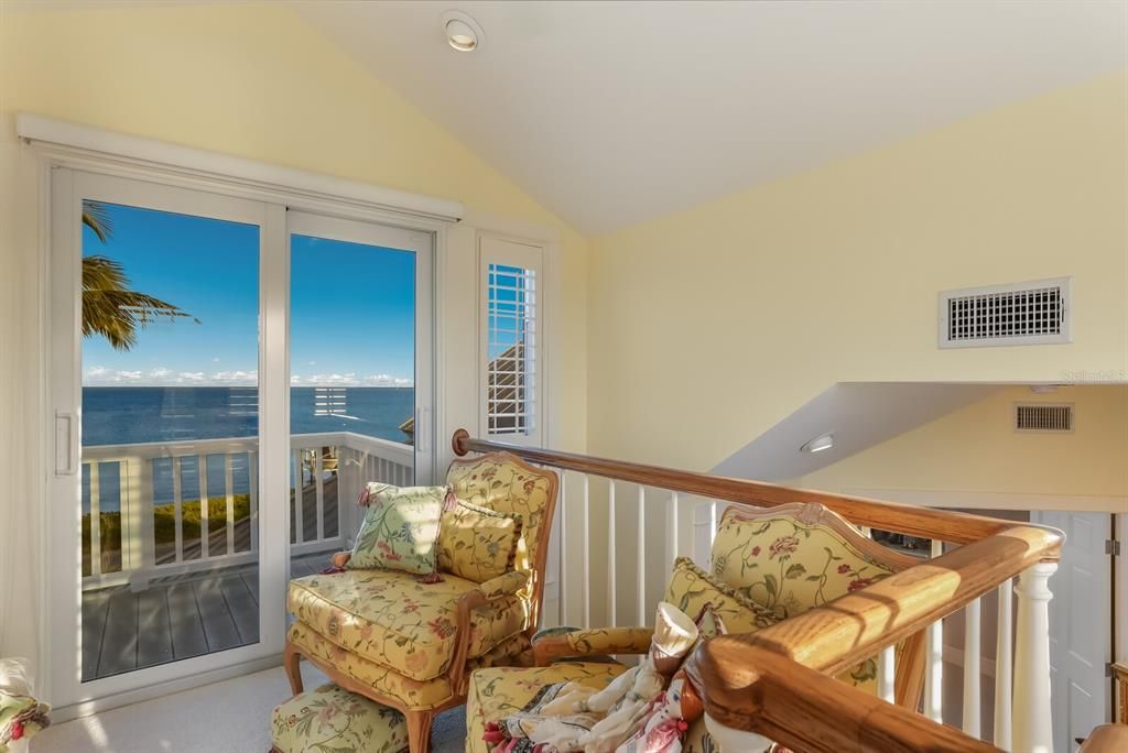 Top floor loft with deck featuring gorgeous views of Charlotte Harbor (perfect place to read or write!)