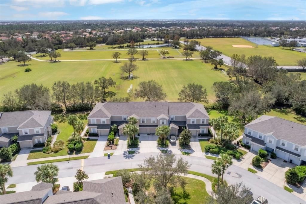 Aerial showing the town home backing up to Greenbrook park.