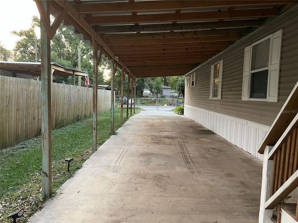 Long driveway can accomodate multiple vehicles.