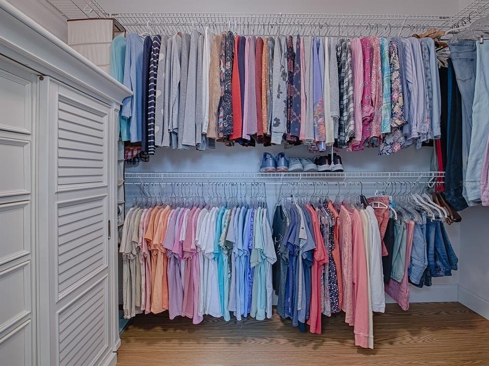 This walk-in closet is big enough to share and accommodate a wardrobe dresser ~