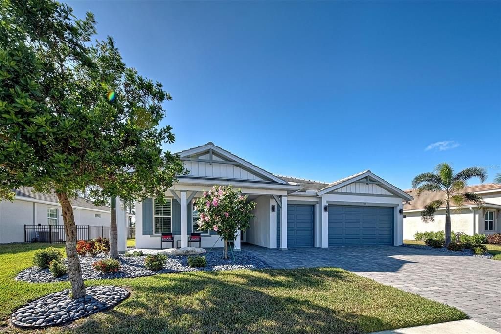 Home has the coveted 3 car garage and been professionally landscaped with lush landscaping and beautiful flowering hibiscus tree.  Maintenace free means no yard work for you, leaving you time to relax and enjoy life to the fullest.