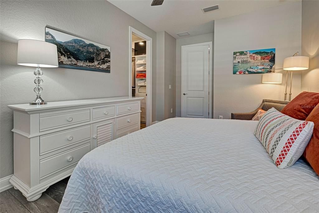 Generously sized 2nd master suite also has a walk-in closet with custom shelving.