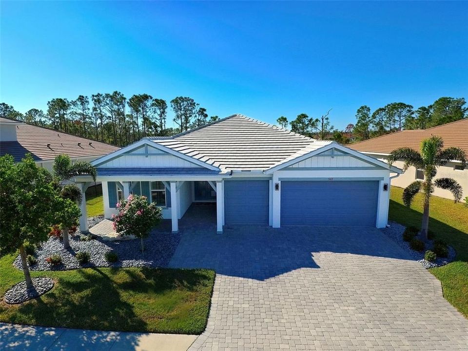 Paver driveway and walkway enhance the curb appeal of this wonderful home.  Rest easy knowing the entire home has hurricane impact windows and sliders.  A whole house generator with 500-gallon propane tank and electric hurricane lanai screen offer additional peace of mind.