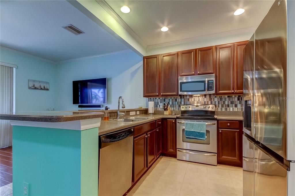 Kitchen with view of family room.