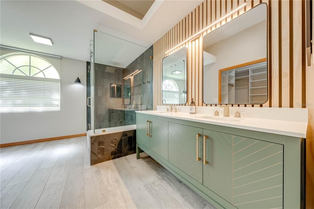 Accent Wall, Vanity, 2 sinks and Stunning Shower