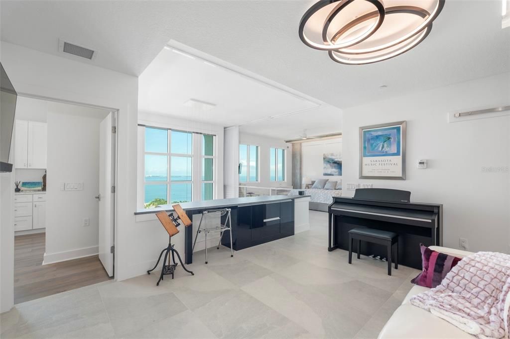 The upstairs loft area features a serene sitting room