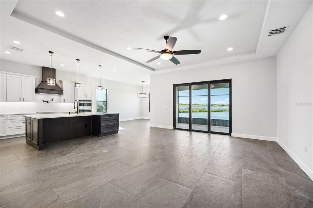 Great Room, Kitchen, Dining Room & lanai with water view