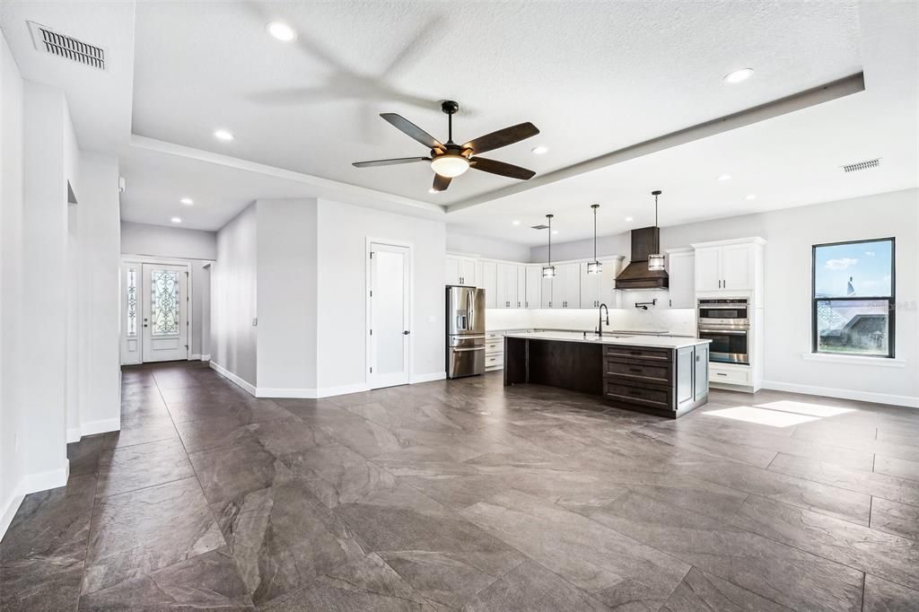 Kitchen Island & wWalk-in Pantry with a glass door