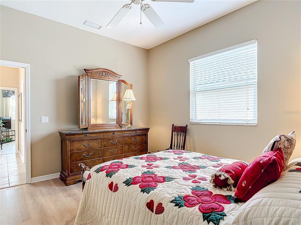 Bedroom 2 with walk-in closet and LVP floors