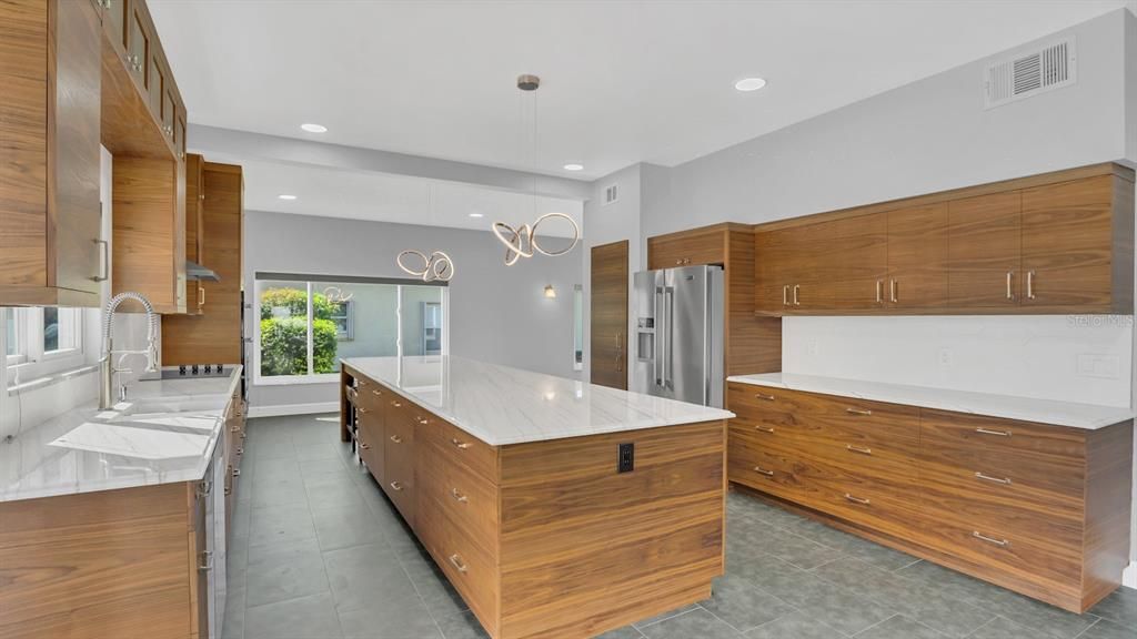 Chef's Kitchen with a large quartz island to entertain